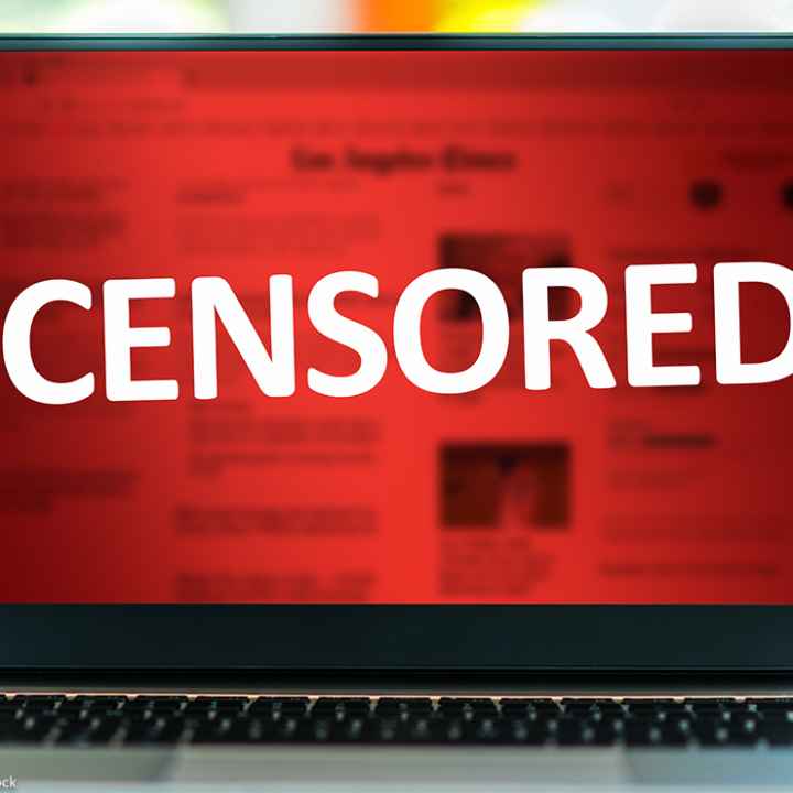 A laptop with the word "CENSORED" in white on a red background.